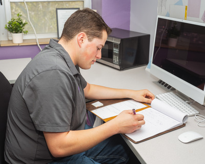 Pena at Desk