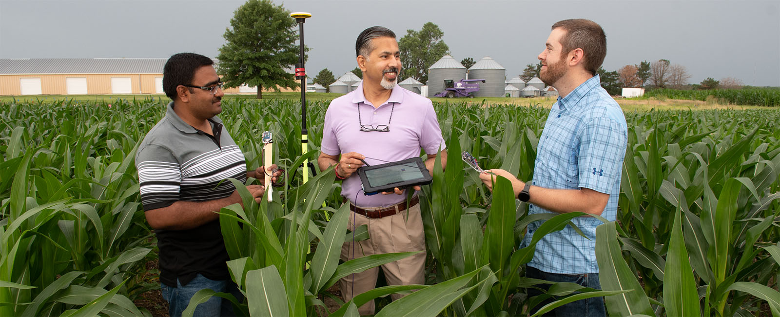 K-State agriculture students working with moisture sensors