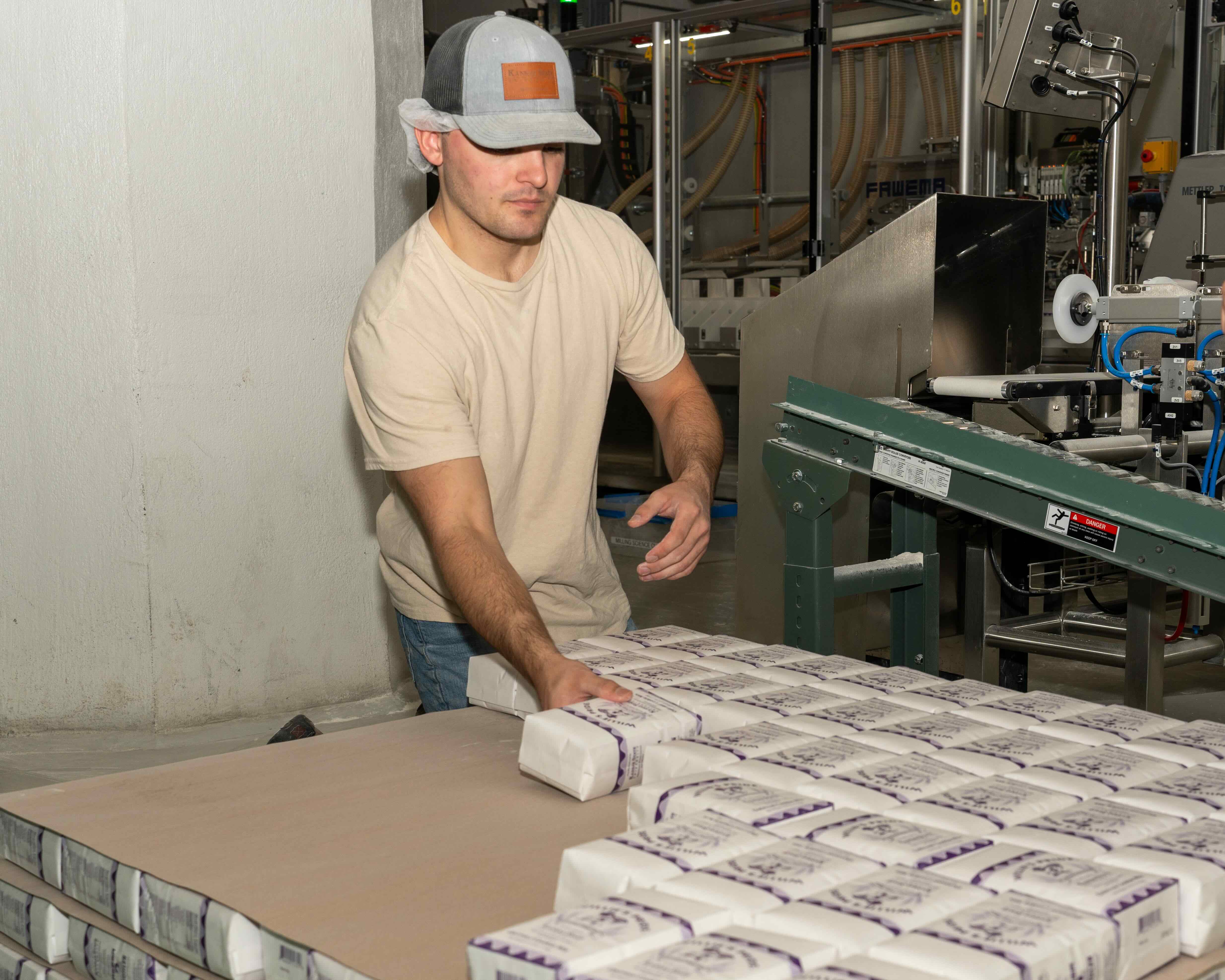 Student working in the flour mill